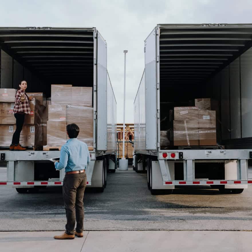 CARRIER_DELIVERY_DOOR_OPEN_A_0044_R1-1 trucks being unloaded